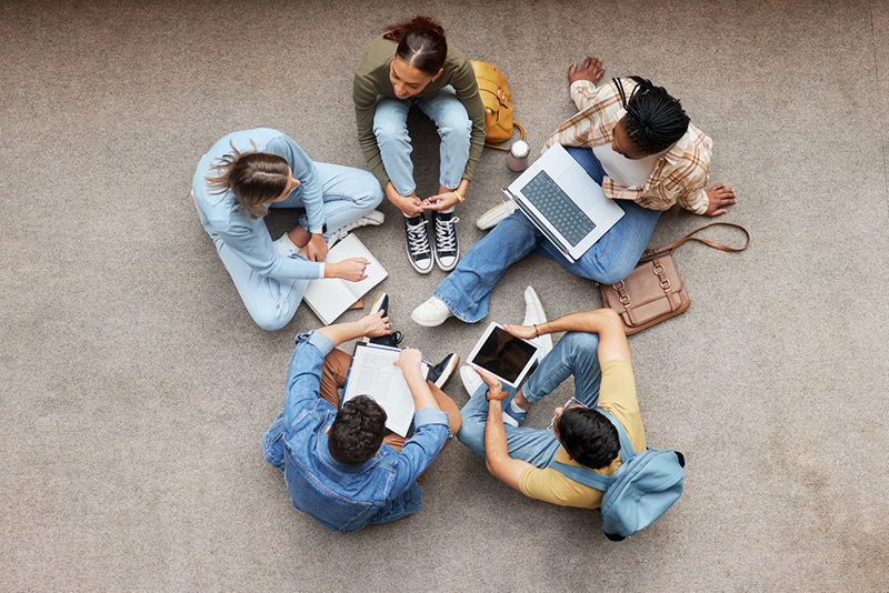 When plans meet people: navigating the friction of group assessment