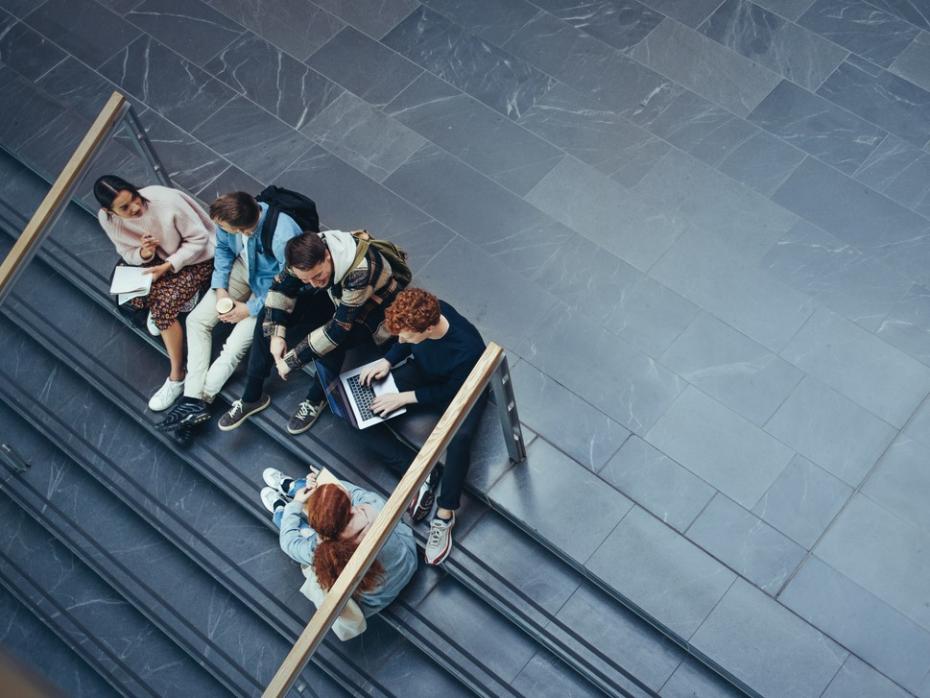 Students sitting together on campus