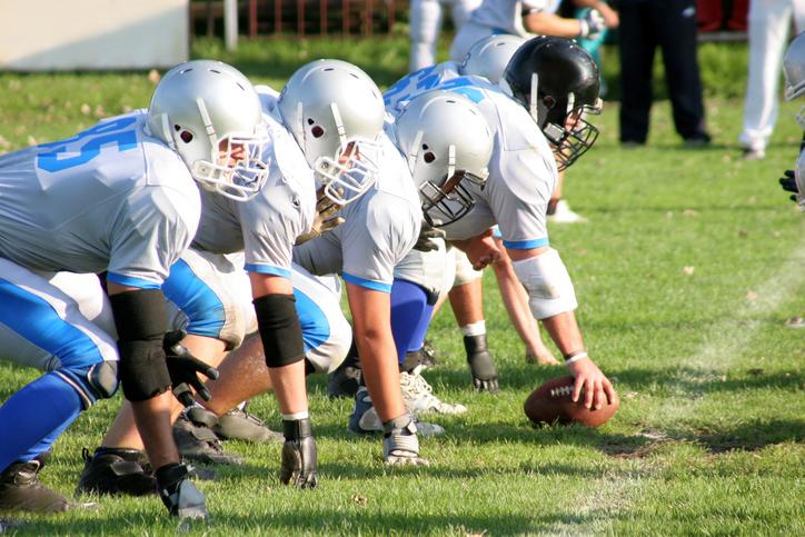 American football team starting a new play