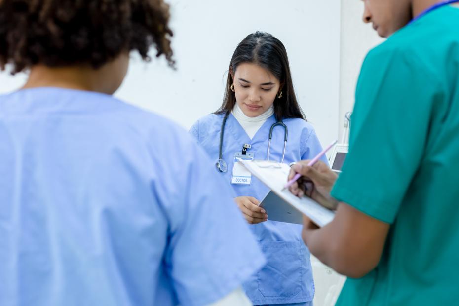 Student nurses taking notes