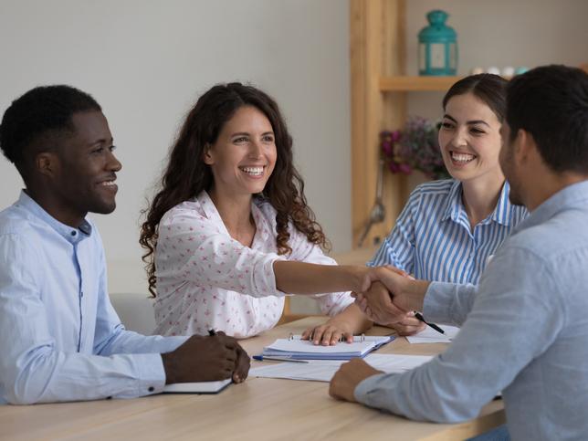 Diverse group of people around a table