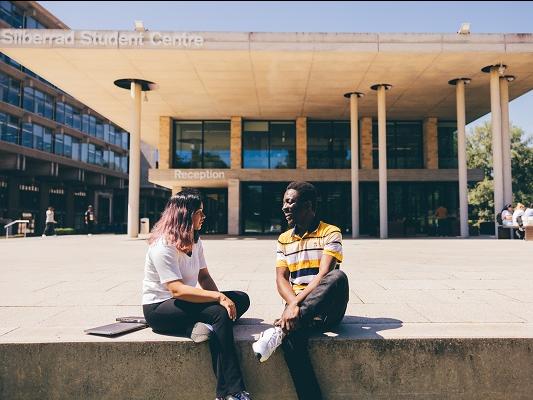 Students sitting outside Siberrad Student Centre