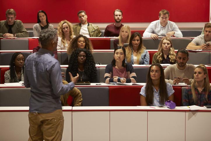 Man teaching a university class