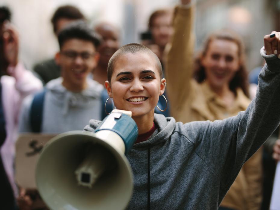 Student with a megaphone on a march