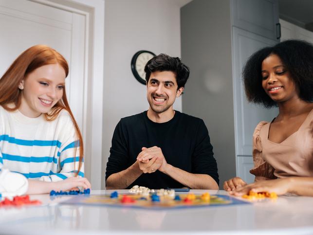 students playing a board game