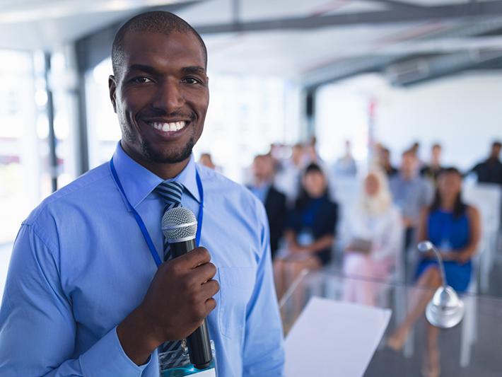 Black man giving presentation