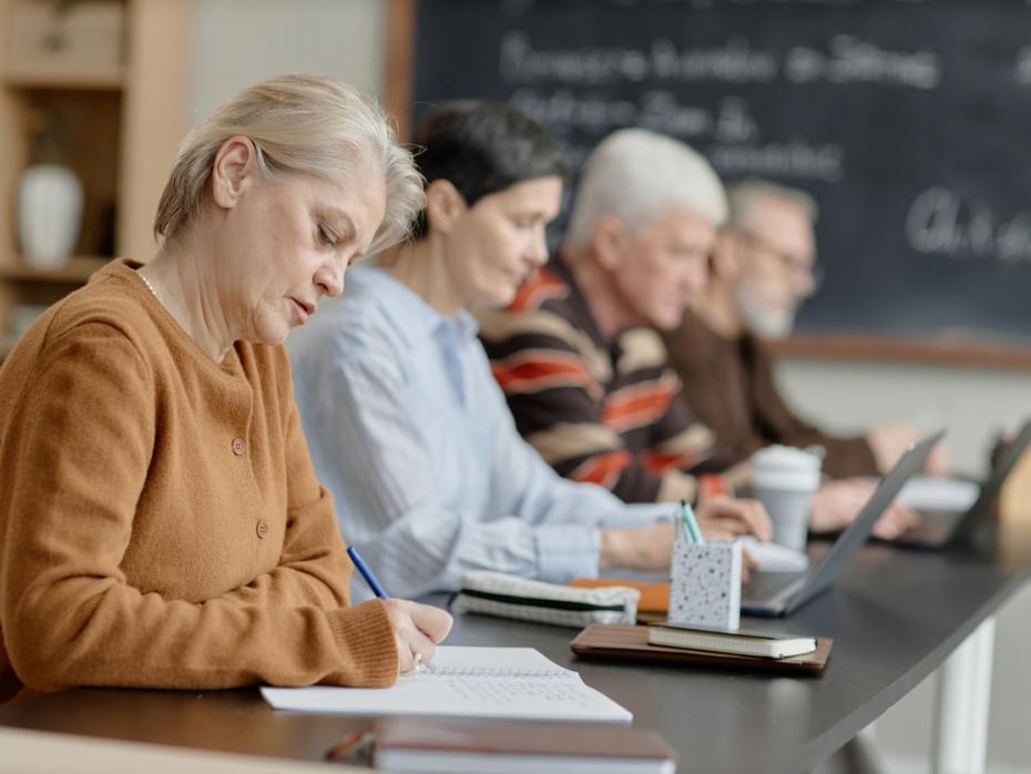 A group of faculty writing together.