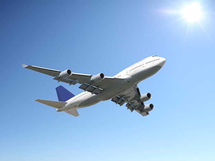 Airliner in blue sky