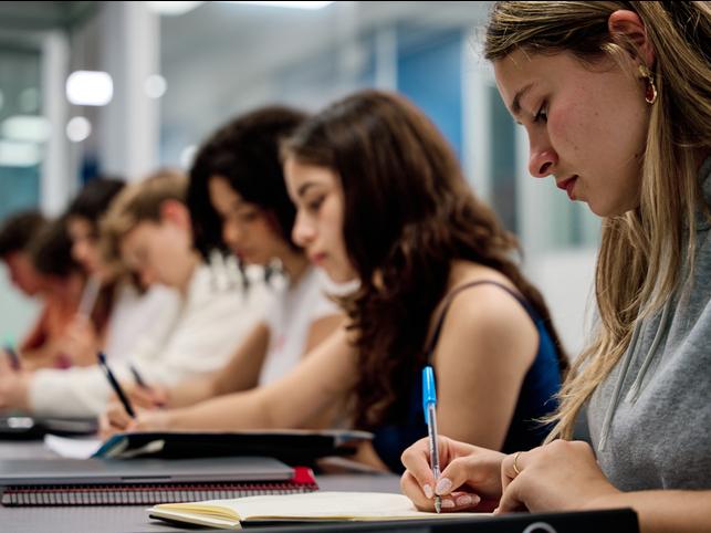 Students write in class