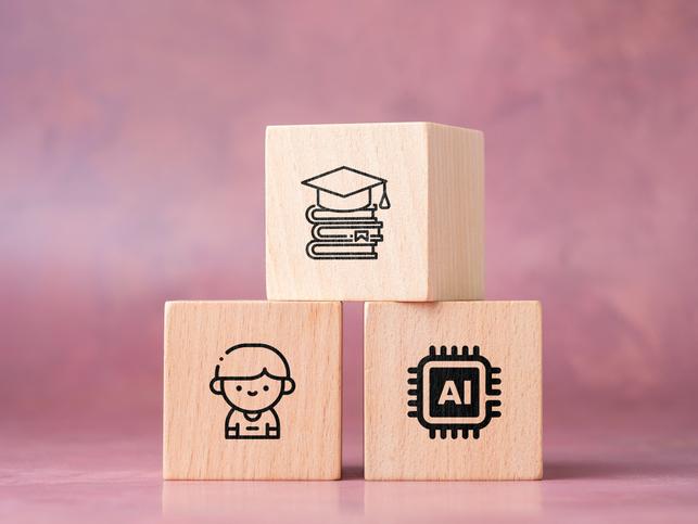 Building blocks with student, books and an AI chip