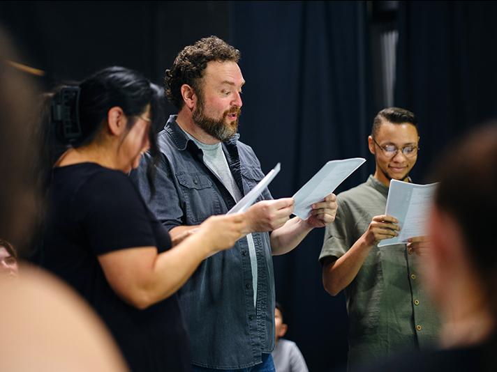 Actors rehearsing a scene