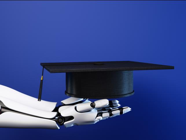 Robot hands hold a mortarboard