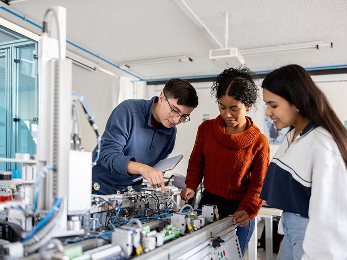 Robotics students in a practical university class