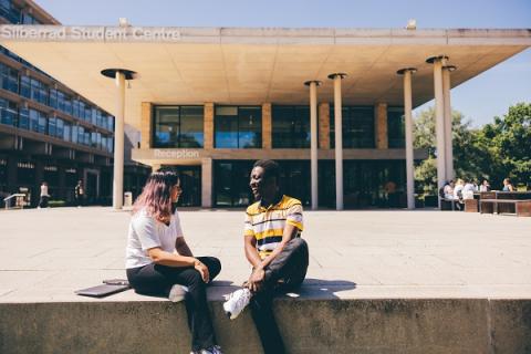 Students sitting outside Siberrad Student Centre