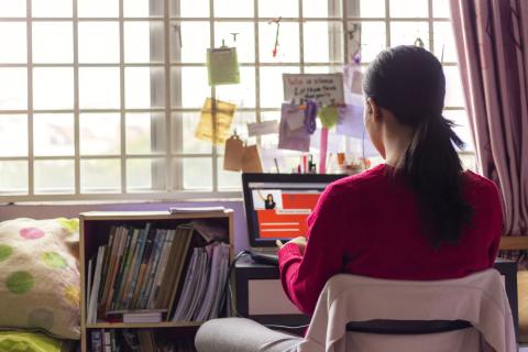 Student studying online at home