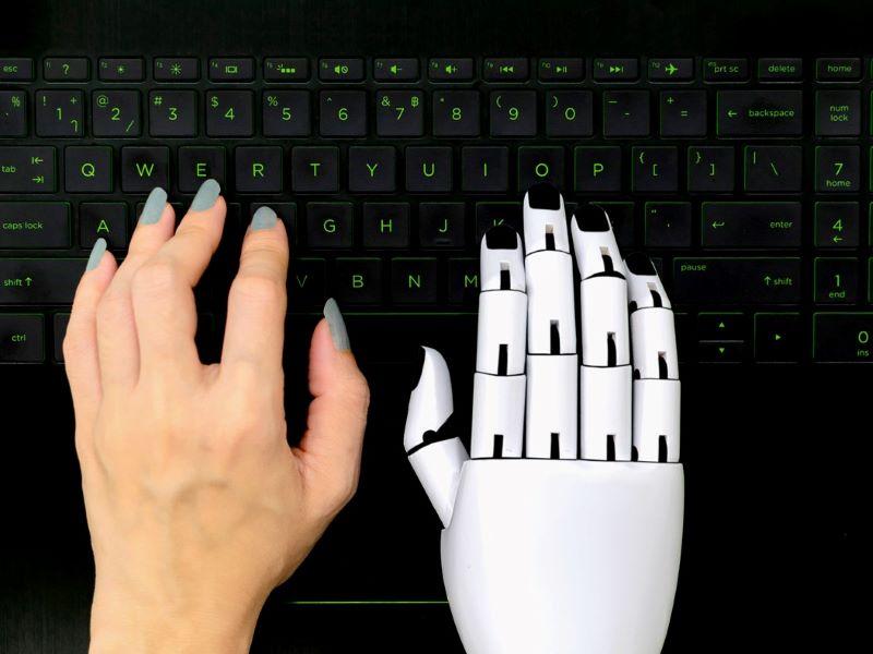 Image showing a human and AI writing together