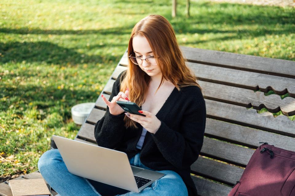 A student uses a chat bot while she studies