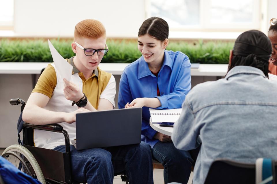 Students working on a project together in class