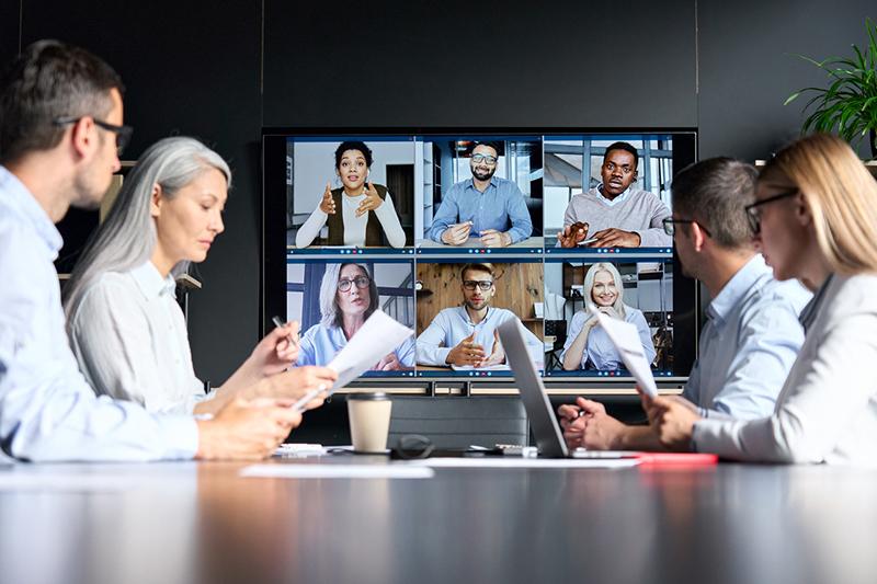 Multicultural people in an online meeting