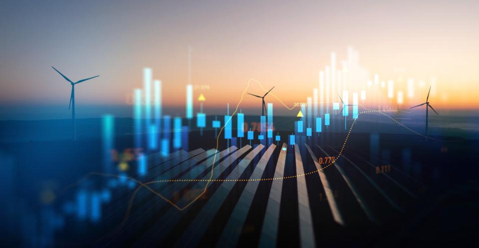 Wind turbines and solar panels across the horizon