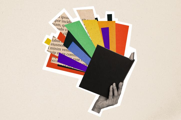 An illustration of a book with coloured and newsprint rays shining out from it