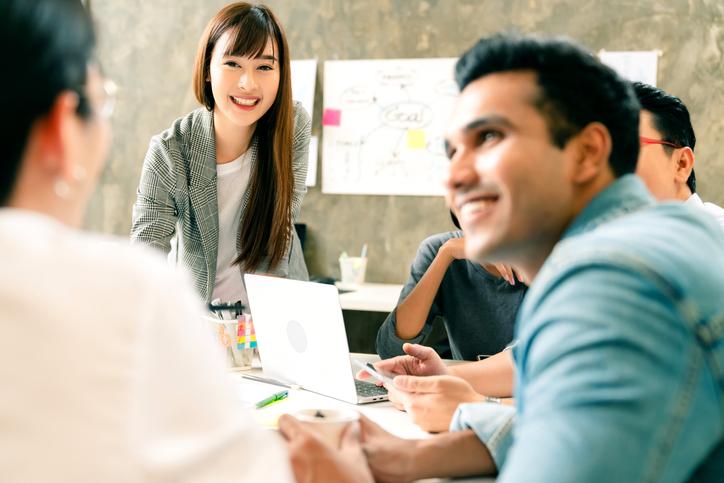 Academics discuss ideas in a meeting