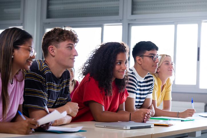 Students listen attentively during a class