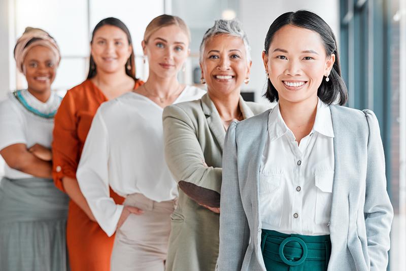 Multiracial group of women, women in university leadership concept