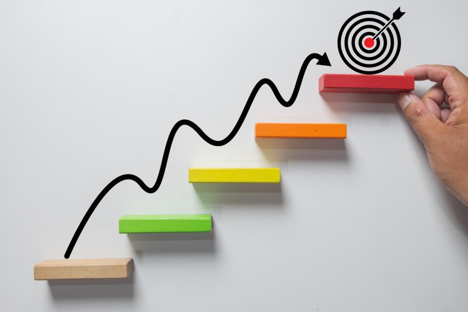 A ladder leading to a target
