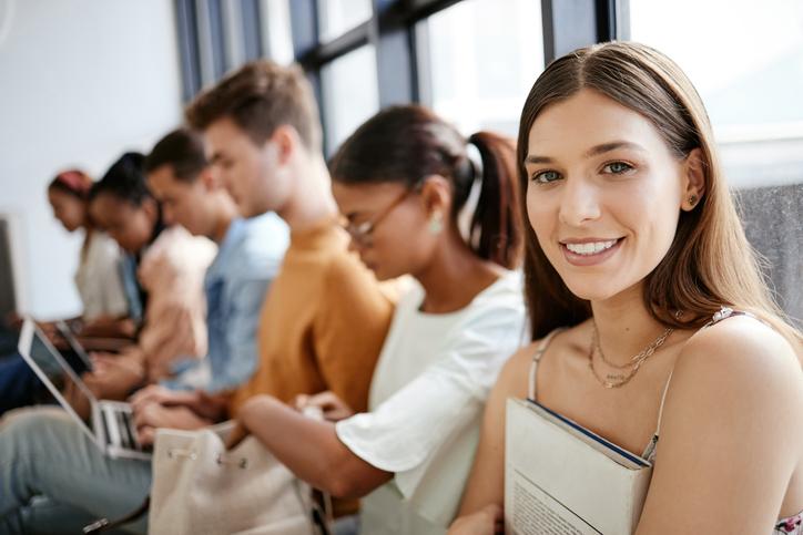 Students sit together