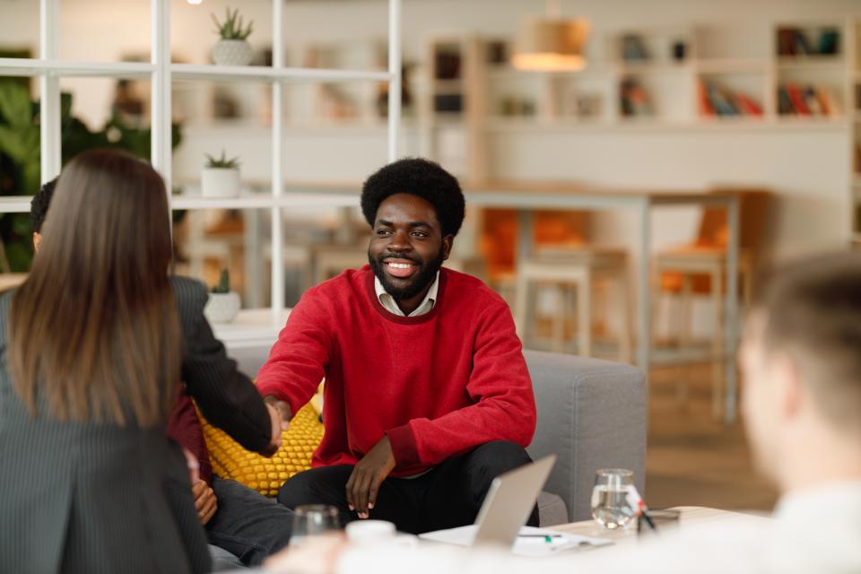 A handshake in a business meeting