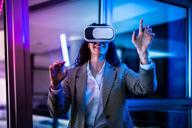 Young woman wearing virtual reality headset