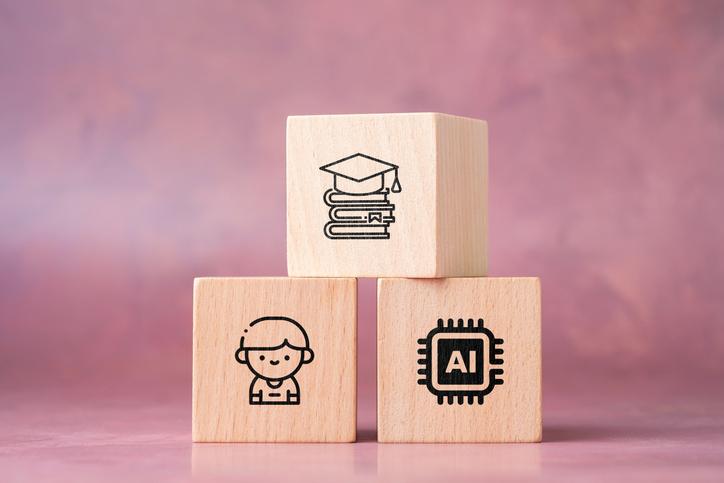Building blocks with student, books and an AI chip