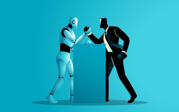 A robot and a man in a business suit arm wrestle