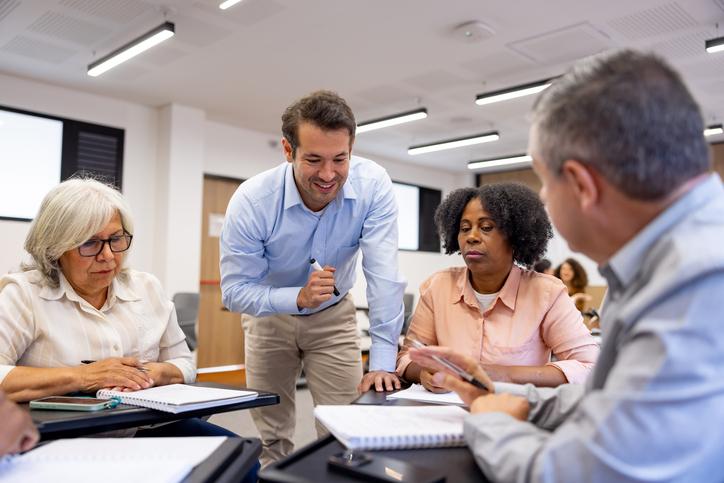 He professionals working together on an educational project