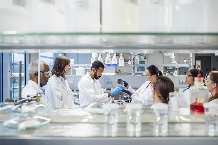 Scientists work together in a lab