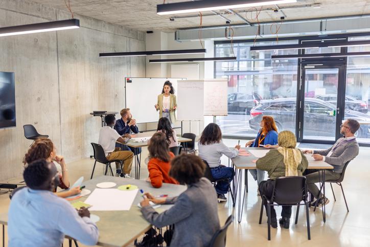 An academic leading seminar activities with flipchart 