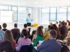 Image of a lecturer teaching a class of adult students