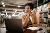 black female professor working in the library