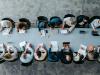 A large team working together at a table - top-down view