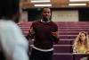 A young student stands up to make a point