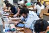 University students sitting exams