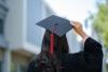 A graduate wearing a mortarboard