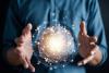 Man holding glowing orb