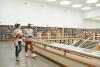 Students walking through a university library
