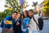 Students pose for a group selfie