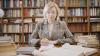 An academic working in a library