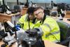 Two engineers in a robotics workshop