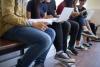 Students looking at various online devices